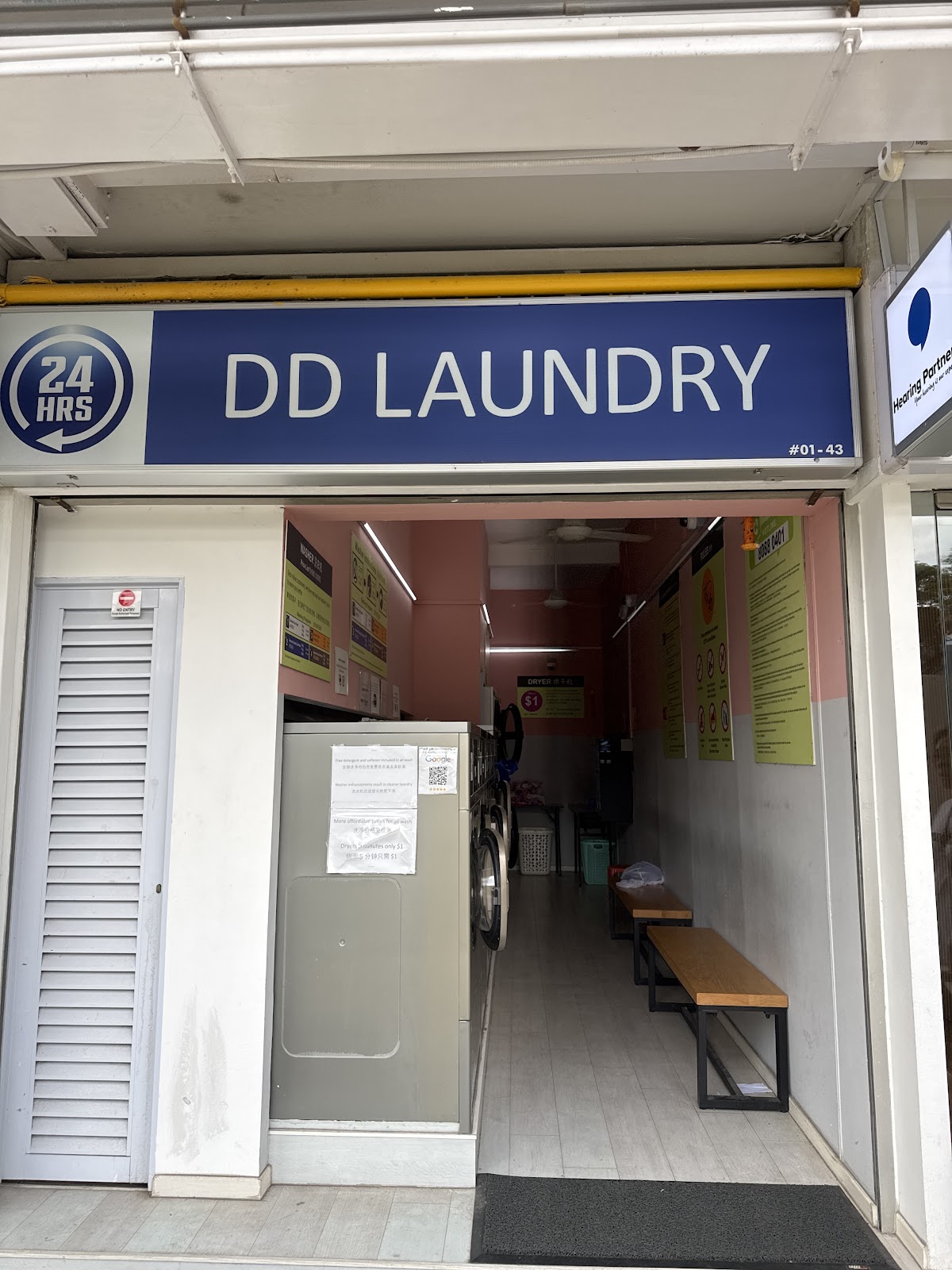 Daytime shopfront with 24 hours sign at Block 320 Clementi Ave 4